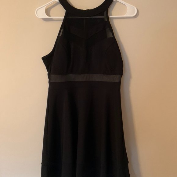 Black Dress with mesh around the waist. - Picture 1 of 2